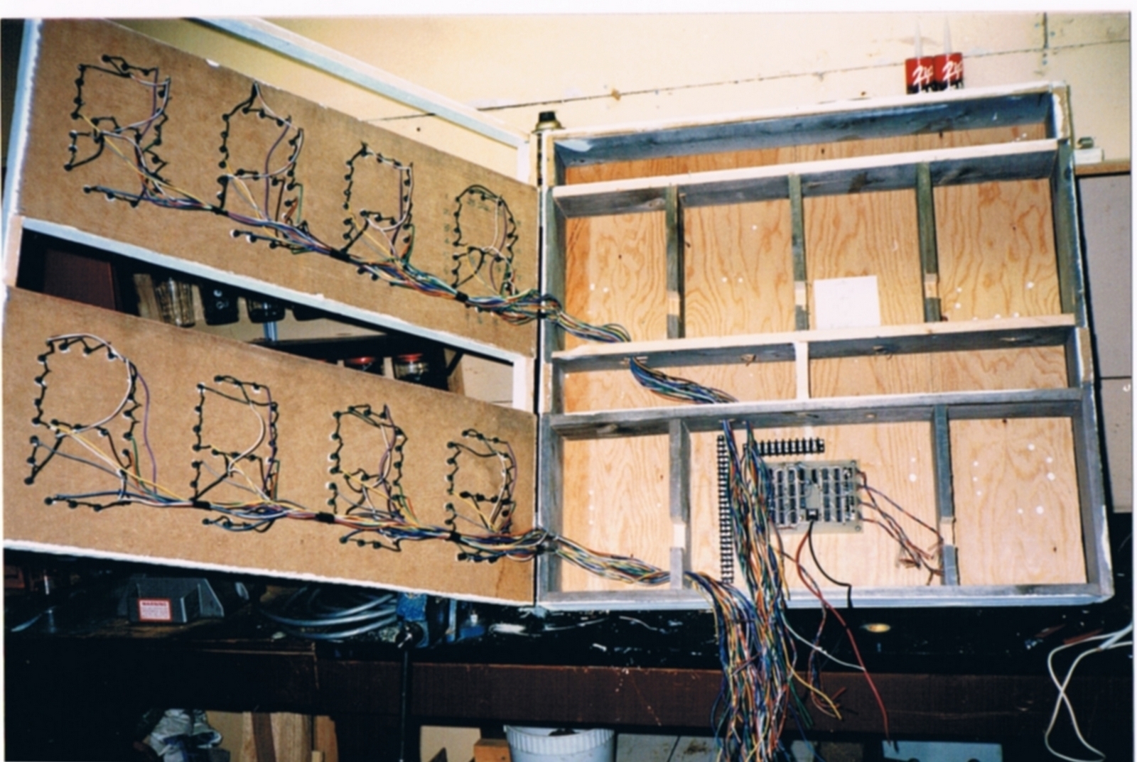 Inside the scoreboard showing wiring and electronics
